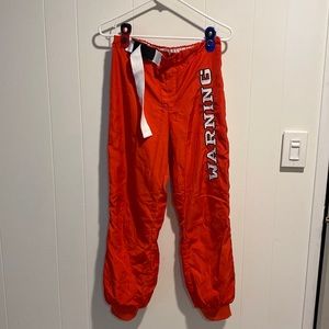 Fashion nova red rave pants